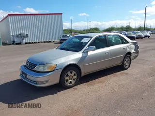 2003 Toyota Avalon XL z VIN 4T1BF28B93U274928, wystawiony jako IAAI lot #42034461 z przebiegiem 150 549 mil mil oraz . Historia ofert i sprzedaży dostępna na DreamBid. Obrazek 19.