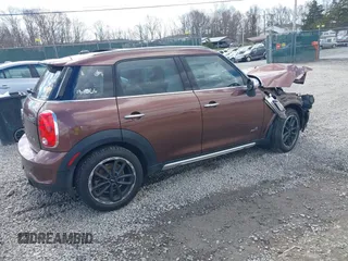 2016 MINI Countryman S z VIN WMWZC5C55GWU01180, wystawiony jako IAAI lot #41874470 z przebiegiem 194 997 mil mil oraz . Historia ofert i sprzedaży dostępna na DreamBid. Obrazek 4.