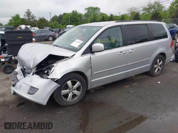 2011 Volkswagen Routan SE z VIN 2V4RW3DGXBR772583, wystawiony jako IAAI lot #42222200 z przebiegiem 213 724 mil mil oraz . Historia ofert i sprzedaży dostępna na DreamBid. Obrazek 2.