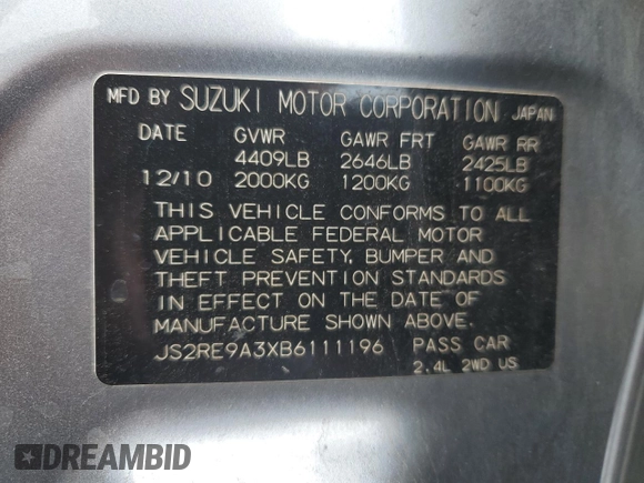 2011 Suzuki Kizashi SE z VIN JS2RE9A3XB6111196, wystawiony jako Copart lot #48076635 z przebiegiem 113 569 mil mil oraz Szkody całkowita. Historia ofert i sprzedaży dostępna na DreamBid. Obrazek 12.