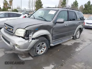 2003 Toyota Sequoia SR5 with VIN 5TDBT44A23S158061, listed as a IAAI auction lot 41807142 with 247,472 mi miles and . Bid and sale history available at DreamBid. Image 2.
