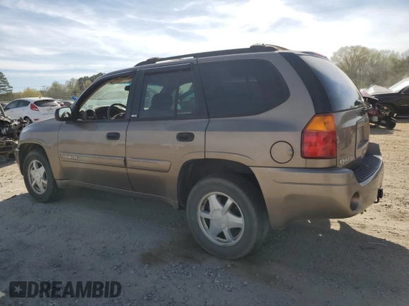 2003 GMC Envoy SLT z VIN 1GKDS13S032134647, wystawiony jako Copart lot #50137325 z przebiegiem 217 878 mil mil oraz Szkody całkowita. Historia ofert i sprzedaży dostępna na DreamBid. Obrazek 2.