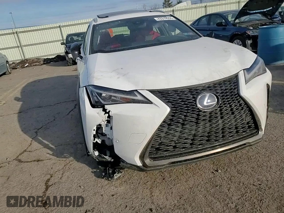 2021 Lexus UX with VIN JTHR9JBH2M2049747, listed as a Copart auction lot 43319555 with 22,606 mi miles and Salvage Title. Bid and sale history available at carsss.com. Image 12.