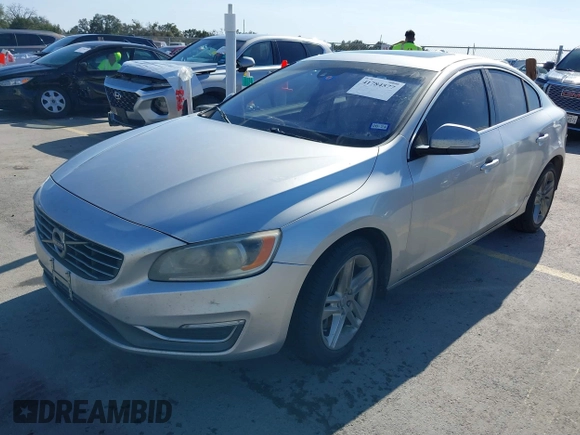 2014 Volvo S60 T5 z VIN YV1612FS7E1290034, wystawiony jako IAAI lot #41784577 z przebiegiem 200 780 mil mil oraz . Historia ofert i sprzedaży dostępna na DreamBid. Obrazek 2.