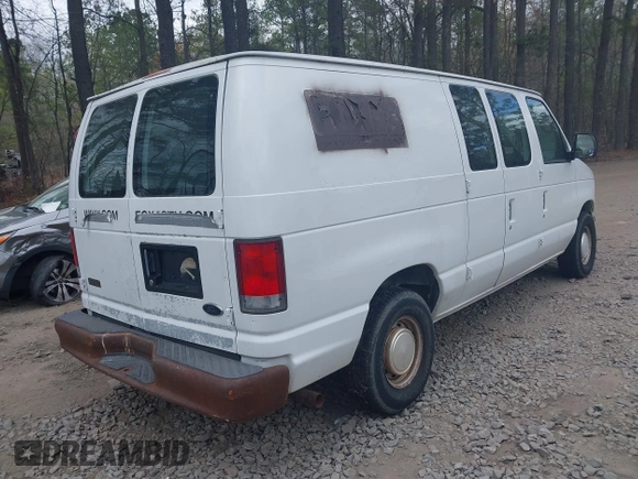 2001 Ford Econoline Cargo with VIN 1FTRE14261HA74696, listed as a IAAI auction lot 41915335 with 124,282 mi miles. Bid and sale history available at carsss.com. Image 4.