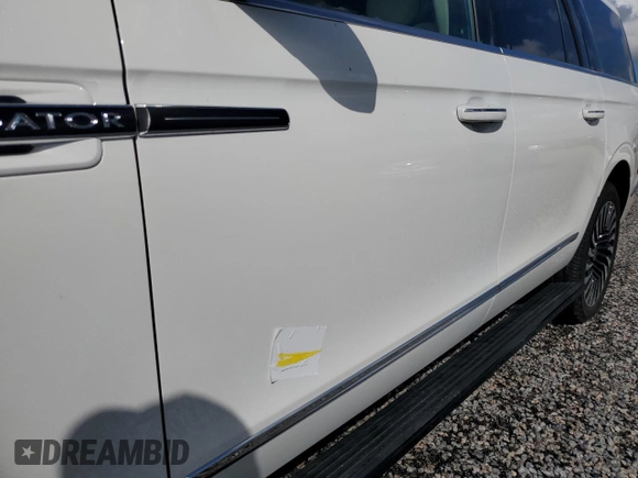 2020 Lincoln Navigator Black Label z VIN 5LMJJ3TT4LEL21595, wystawiony jako Copart lot #73951494 z przebiegiem Nie podano mil oraz Szkoda całkowita • Salvage title. Historia ofert i sprzedaży dostępna na DreamBid. Obrazek 13.