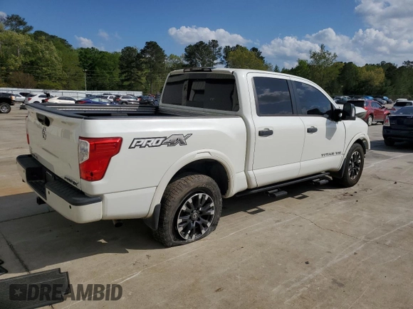 2019 Nissan Titan Pro-4X z VIN 1N6AA1E51KN526104, wystawiony jako Copart lot #51694335 z przebiegiem 56 620 mil mil oraz Szkoda całkowita • Salvage title. Historia ofert i sprzedaży dostępna na DreamBid. Obrazek 3.