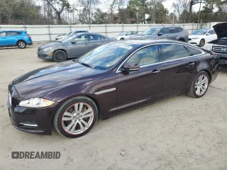 2013 Jaguar XJ with VIN SAJWA2G12DLV57581, listed as a Copart auction lot 84736054 with 91,779 mi miles and Salvage Title. Bid and sale history available at carsss.com. Image 1.