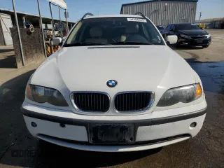 2003 BMW 3 Series 325i with VIN WBAEN33483PC12177, listed as a Copart auction lot 54206945 with 125,512 mi miles and Salvage Title. Bid and sale history available at DreamBid. Image 5.