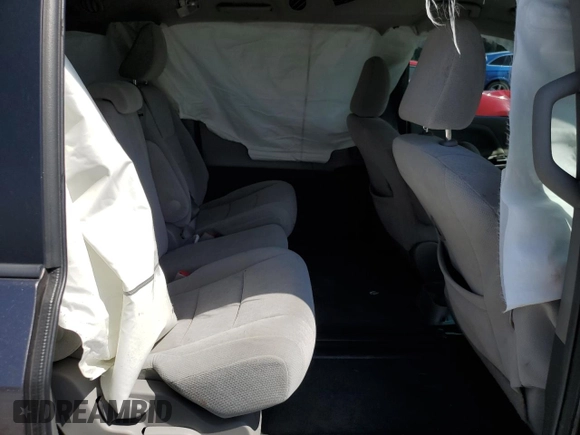 2015 Toyota Sienna LE AAS с VIN 5TDKK3DC3FS637513, выставлен на аукционе Copart как лот 57473035 с пробегом 133 997 миль миль и Списание • Salvage title. История ставок и продаж доступна на DreamBid. Изображение 11.