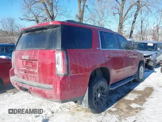 2015 GMC Yukon SLE with VIN 1GKS2AKC2FR514005, listed as a IAAI auction lot 41292783 with 129,413 mi miles. Bid and sale history available at carsss.com. Image 4.