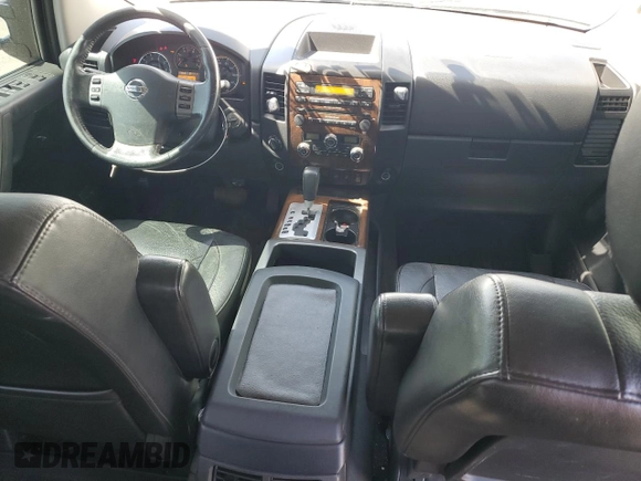 2011 Nissan Titan Pro-4X with VIN 1N6BA0EC2BN317628, listed as a Copart auction lot 52367505 with 178,601 mi miles and Salvage title. Bid and sale history available at DreamBid. Image 8.