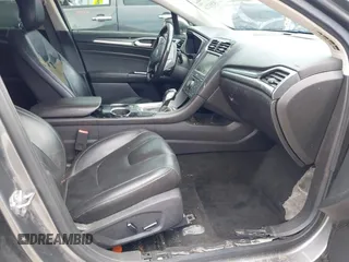 2013 Ford Fusion Titanium with VIN 3FA6P0K96DR131317, listed as a IAAI auction lot 42552736 with 154,762 mi miles and . Bid and sale history available at DreamBid. Image 5.