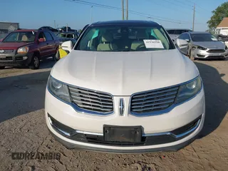 2016 Lincoln MKX Reserve with VIN 2LMTJ6LR4GBL75275, listed as a IAAI auction lot 41936550 with 76,177 mi miles. Bid and sale history available at carsss.com. Image 12.
