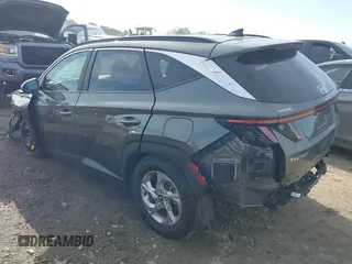 2022 Hyundai Tucson SEL with VIN 5NMJBCAEXNH031855, listed as a IAAI auction lot 41677386 with 40,606 mi miles and . Bid and sale history available at DreamBid. Image 3.
