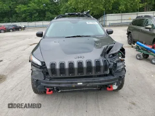 2014 Jeep Cherokee Trailhawk z VIN 1C4PJMBS9EW159721, wystawiony jako Copart lot #60719525 z przebiegiem 136 807 mil mil oraz Szkoda całkowita • Salvage title. Historia ofert i sprzedaży dostępna na DreamBid. Obrazek 5.