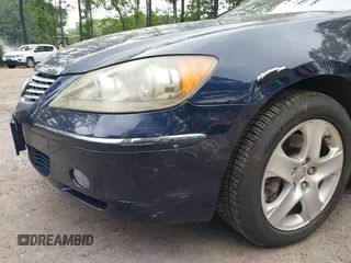2006 Acura RL z VIN JH4KB16566C007214, wystawiony jako IAAI lot #42510457 z przebiegiem 160 005 mil mil oraz . Historia ofert i sprzedaży dostępna na DreamBid. Obrazek 6.