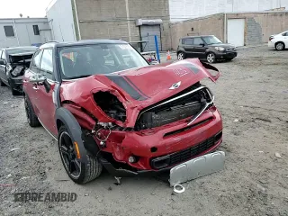 2016 MINI Countryman S with VIN WMWZC5C51GWU01015, listed as a Copart auction lot 51223155 with 74,602 mi miles and Salvage Title. Bid and sale history available at DreamBid. Image 11.