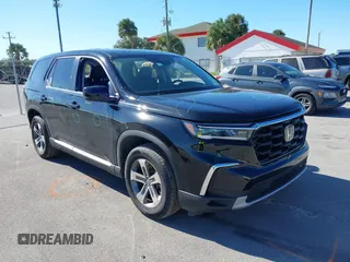 2025 Honda Pilot EX-L with VIN 5FNYG1H4XSB035662, listed as a IAAI auction lot 40976211 with 1,208 mi miles and . Bid and sale history available at DreamBid. Image 1.