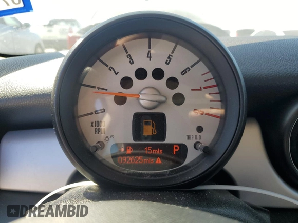 2013 MINI Hardtop with VIN WMWSU3C56DT682857, listed as a Copart auction lot 77677234 with 92,625 mi miles and Clean Title. Bid and sale history available at DreamBid. Image 9.