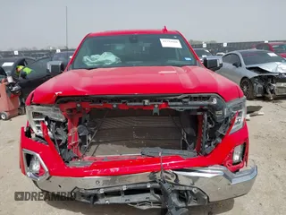2021 GMC Sierra 1500 SLT z VIN 3GTU9DED9MG291383, wystawiony jako IAAI lot #41794666 z przebiegiem 93 457 mil mil oraz . Historia ofert i sprzedaży dostępna na DreamBid. Obrazek 12.