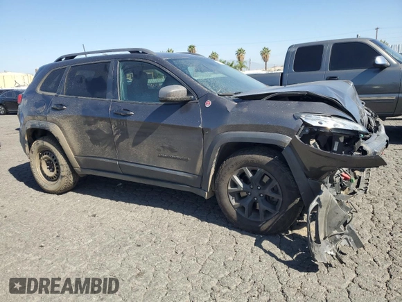 2017 Jeep Cherokee Trailhawk L Plus with VIN 1C4PJMBS4HD237094, listed as a Copart auction lot 61051675 with 104,852 mi miles and Salvage title. Bid and sale history available at DreamBid. Image 4.