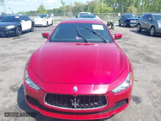 2015 Maserati Ghibli with VIN ZAM57XSA5F1129883, listed as a IAAI auction lot 41920750 with 63,739 mi miles. Bid and sale history available at carsss.com. Image 12.