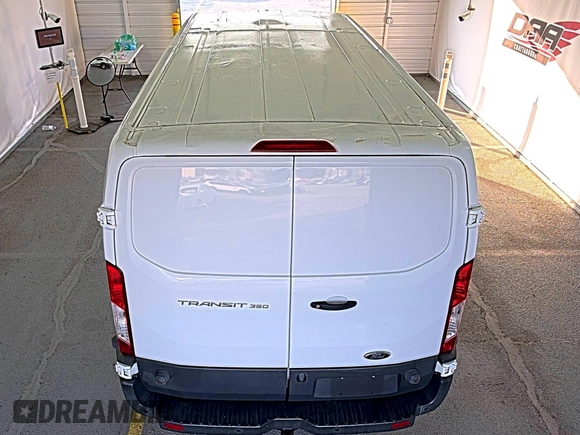 2018 Ford Transit with VIN 1FTBW2ZM8JKA77066, listed as a IAAI auction lot 42642396 with 215,234 mi miles and . Bid and sale history available at DreamBid. Image 13.