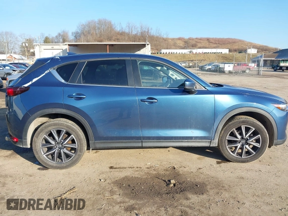 2018 Mazda CX-5 Touring z VIN JM3KFBCM2J0461954, wystawiony jako IAAI lot #41655865 z przebiegiem 129 333 mil mil oraz . Historia ofert i sprzedaży dostępna na DreamBid. Obrazek 12.
