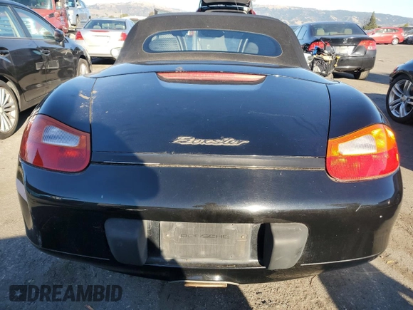 2000 Porsche Boxster z VIN WP0CA2983YU621686, wystawiony jako Copart lot #88951585 z przebiegiem 127 276 mil mil oraz Tytuł czysty. Historia ofert i sprzedaży dostępna na DreamBid. Obrazek 6.