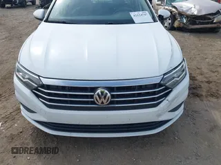 2021 Volkswagen Jetta S z VIN 3VWC57BU0MM021874, wystawiony jako IAAI lot #42124747 z przebiegiem 89 887 mil mil oraz . Historia ofert i sprzedaży dostępna na DreamBid. Obrazek 12.