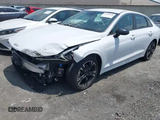 2023 Kia K5 GT-Line z VIN 5XXG64J25PG220733, wystawiony jako IAAI lot #42109640 z przebiegiem 30 917 mil mil oraz . Historia ofert i sprzedaży dostępna na DreamBid. Obrazek 2.
