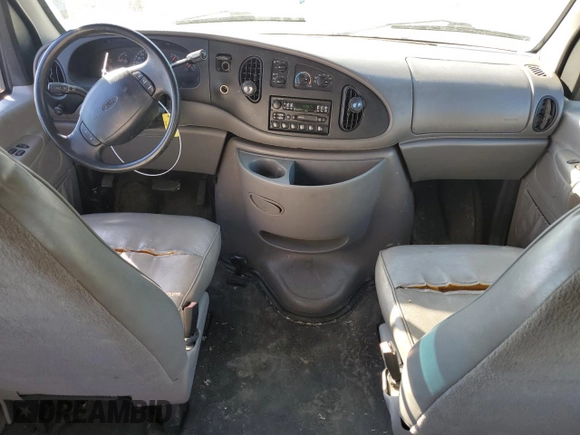 1999 Ford Econoline Passenger XL with VIN 1FBSS31L5XHC16908, listed as a Copart auction lot 83490434 with 159,900 mi miles and Salvage Title. Bid and sale history available at DreamBid. Image 8.