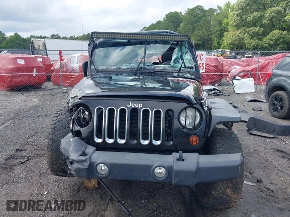 2012 Jeep Wrangler Unlimited Sport with VIN 1C4BJWDG8CL120308, listed as a IAAI auction lot 42365817 with 190,619 mi miles and . Bid and sale history available at DreamBid. Image 13.