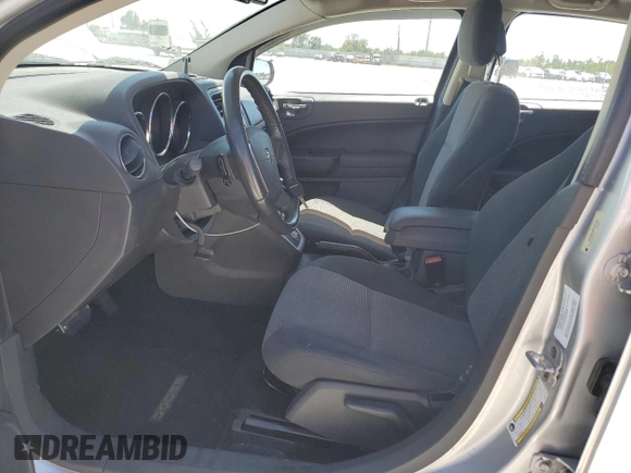 2011 Dodge Caliber Heat with VIN 1B3CB5HA9BD247323, listed as a Copart auction lot 49677535 with 52,887 mi miles and Salvage Title. Bid and sale history available at DreamBid. Image 7.