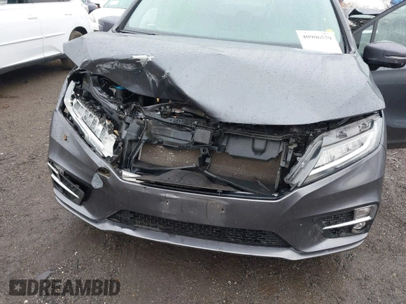 2019 Honda Odyssey Elite with VIN 5FNRL6H91KB048535, listed as a IAAI auction lot 40906579 with 37,322 mi miles and . Bid and sale history available at DreamBid. Image 6.