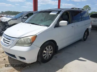 2009 Honda Odyssey EX-L with VIN 5FNRL386X9B056552, listed as a IAAI auction lot 42126144 with 194,722 mi miles. Bid and sale history available at carsss.com. Image 2.