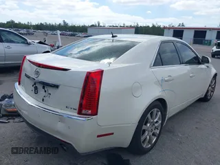 2008 Cadillac CTS RWD with VIN 1G6DV57V880128535, listed as a IAAI auction lot 39097540 with 153,140 mi miles and . Bid and sale history available at DreamBid. Image 4.