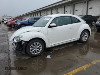 2019 Volkswagen Beetle S with VIN 3VWFD7AT3KM711401, listed as a Copart auction lot 51816915 with 90,385 mi miles and Salvage title. Bid and sale history available at DreamBid. Image 1.