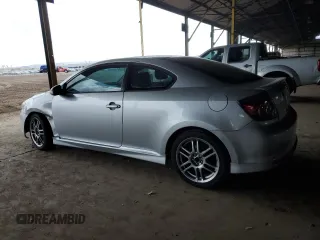 2009 Scion tC with VIN JTKDE167990277992, listed as a Copart auction lot 49703365 with 182,427 mi miles and Salvage Title. Bid and sale history available at carsss.com. Image 2.