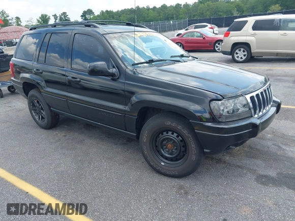 2002 Jeep Grand Cherokee Laredo with VIN 1J4GX48S42C313801, listed as a IAAI auction lot 42297223 with 153,633 mi miles and . Bid and sale history available at DreamBid. Image 1.