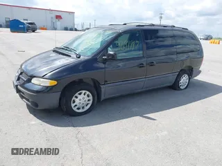 1999 Dodge Grand Caravan with VIN 1B4GP54GXXB897614, listed as a IAAI auction lot 42141997 with 157,698 mi miles and . Bid and sale history available at DreamBid. Image 2.