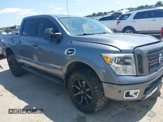 2017 Nissan Titan SV with VIN 1N6AA1E55HN551578, listed as a IAAI auction lot 42392063 with 123,077 mi miles and . Bid and sale history available at DreamBid. Image 1.