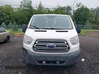 2018 Ford Transit with VIN 1FTYR1ZM1JKB18598, listed as a IAAI auction lot 42533470 with 215,015 mi miles and . Bid and sale history available at DreamBid. Image 12.