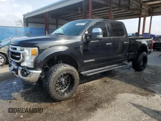2021 Ford Super Duty F-250 SRW XL with VIN 1FT7W2BT1MEC51277, listed as a Copart auction lot 43544475 with 99,324 mi miles and Salvage Title. Bid and sale history available at carsss.com. Image 1.