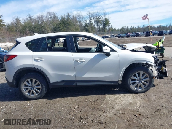 2016 Mazda CX-5 Sport with VIN JM3KE2BY9G0887110, listed as a IAAI auction lot 41761039 with 86,624 mi miles. Bid and sale history available at carsss.com. Image 14.