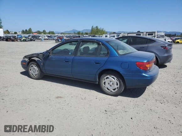 2001 Saturn SL z VIN 1G8ZK547X1Z294553, wystawiony jako Copart lot #53786805 z przebiegiem 288 011 mil mil oraz Szkody całkowita. Historia ofert i sprzedaży dostępna na DreamBid. Obrazek 2.