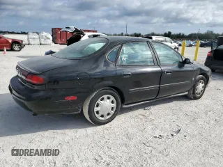 1998 Ford Taurus z VIN 1FAFP52S7WA158927, wystawiony jako Copart lot #45677185 z przebiegiem 68 722 mil mil oraz Szkoda całkowita • Salvage title. Historia ofert i sprzedaży dostępna na DreamBid. Obrazek 3.