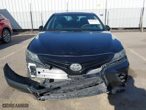 2018 Toyota Camry LE with VIN 4T1B11HK0JU667187, listed as a IAAI auction lot 41816582 with 119,692 mi miles. Bid and sale history available at carsss.com. Image 6.