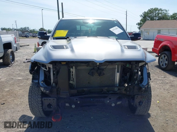 2022 Ram 1500 Rebel z VIN 1C6SRFLT2NN351050, wystawiony jako IAAI lot #41976882 z przebiegiem 59 490 mil mil oraz . Historia ofert i sprzedaży dostępna na DreamBid. Obrazek 13.